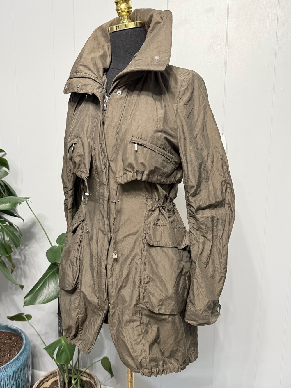#2) Cole Haan Olive Lightweight Rain Jacket with Stylish look